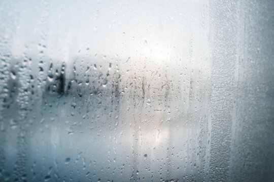 steam on a window of a floating sauna in Sweden