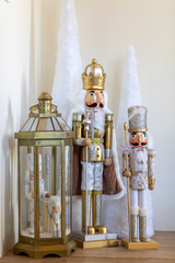 Gold and white nutcrackers in Christmas display