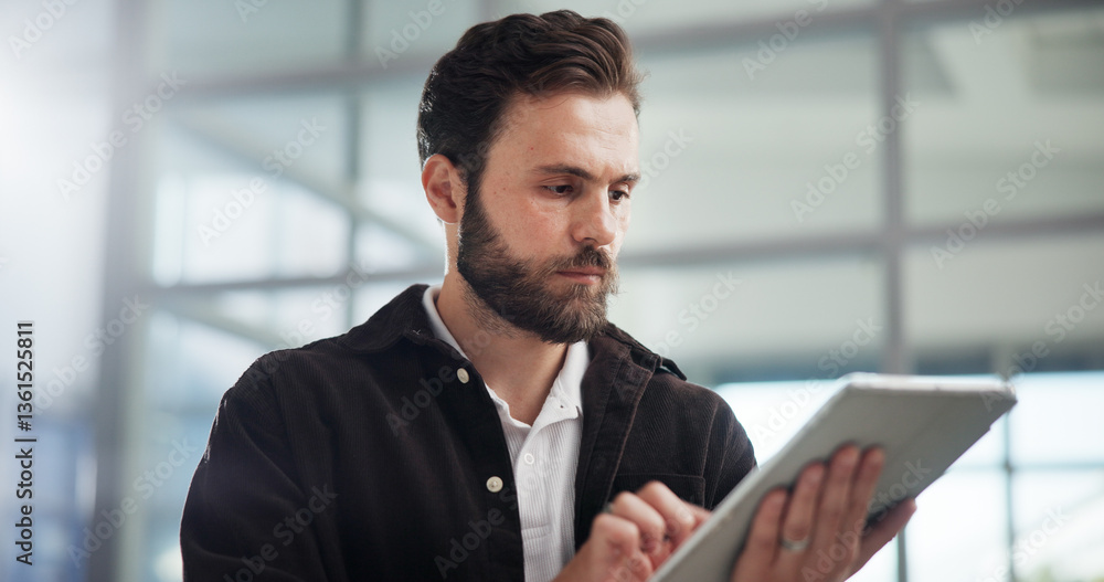 Aufkleber Scroll, creative and business man with tablet in office for networking or social media marketer online. Technology, startup and serious worker reading email, campaign and brand promotion on platform