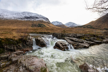 Skyfall Waterfall at the scenic drive through the Glencoe Valley in Scotland, United Kingdom