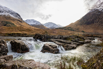 Skyfall Waterfall at the scenic drive through the Glencoe Valley in Scotland, United Kingdom