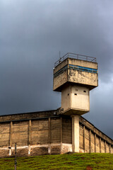 Tower of the penitentiary in the brazilian city. A guard tower on the corner of a prison wall in Brazil
