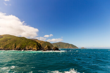 Rugged Island Amidst Turbulent Blue Waters