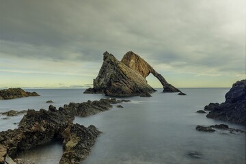 Bow Fiddle Rock, near Cullen beach and Moray coast in Scotland, United Kingdom