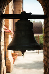 Fototapeta premium Antique Bell in the Arch in the Church