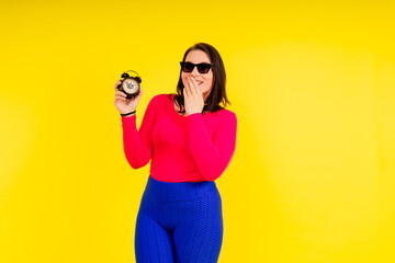 Fototapeta premium Full length photo of a young smiling fat overweight woman wearing sportswear