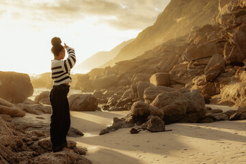 Looking towards golden sunset on the beach in winder