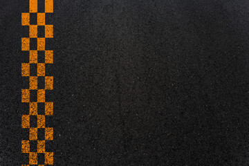 Marquage en pointillés sur asphalte 