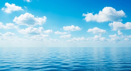 Fototapeta premium 穏やかで青い海と空、白い雲が優しく広がる風景