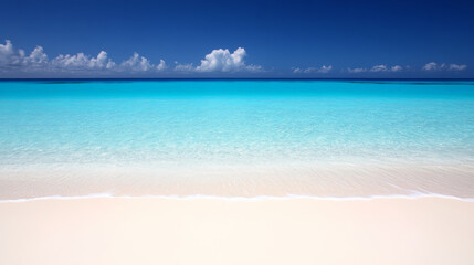 Fototapeta premium Pristine beach with clear turquoise water and blue sky