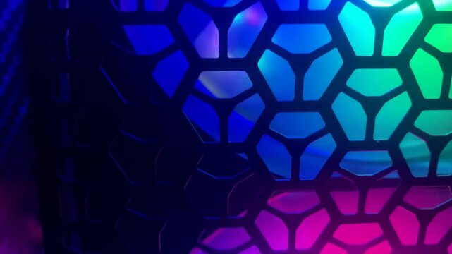 Colorful rgb fan illuminating hexagonal mesh