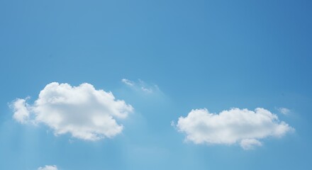 Bright Blue Sky with Soft White Clouds