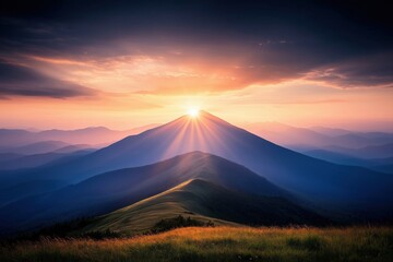 Obraz premium Sunset behind mountain peak casting rays. nature travel inspiration