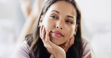 Fototapeta premium Home, bedroom and relax with woman, thinking and choice with contemplation, break and comfort. Apartment, wonder and happy person with thoughts, problem solving and decision with morning or nostalgia