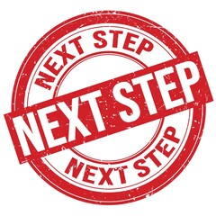 NEXT STEP text written on red round stamp sign