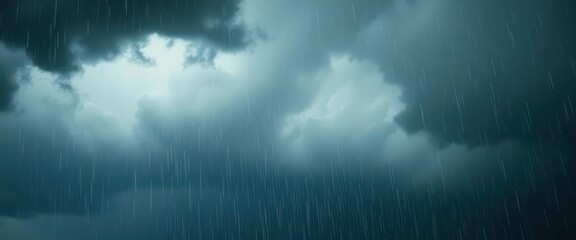 Fototapeta premium Heavy, dark rain clouds unleashing a torrent of rain, heavy rain, deluge