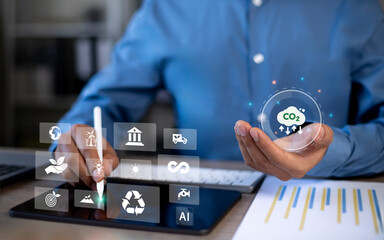 Businessman examines and solves world problems. CO2 concept that represents the problem of carbon...