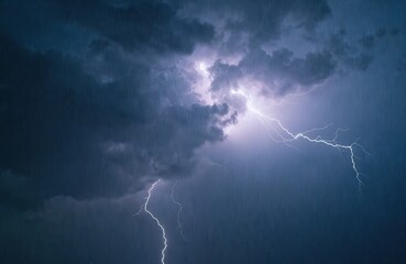 Naklejka premium Dramatic shot of lightning in stormy sky. Heavy rain falling during thunderstorm. Nature power and beauty. Stormy weather background. Weather forecast concept. Dark blue sky and clouds.