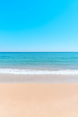 Serene beach scene with tranquil ocean and clear blue sky