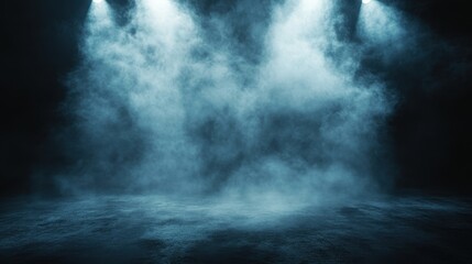 Dramatic stage with blue fog and spotlight lighting in dark theater