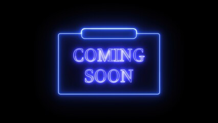 Coming soon neon sign glowing in bright blue against a dark background.