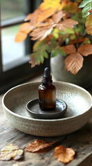Autumnal essence Oil dropper in bowl with fall leaves near window, rustic setting