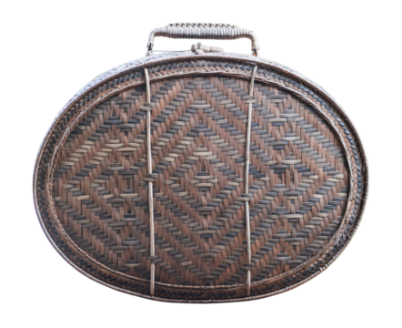 Old brown suitcase with a woven handle sits on transparent background.