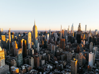 Aerial photo of Manhattan downtown from above at sunrise without clouds. New York, USA.