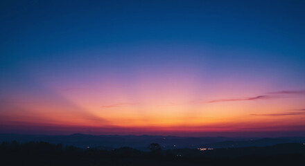 Obraz premium A gradient sky with colors of blue pink and orange glow