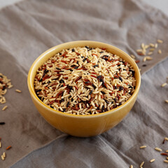 Organic Dry Asian Wild Rice in a Bowl, side view.