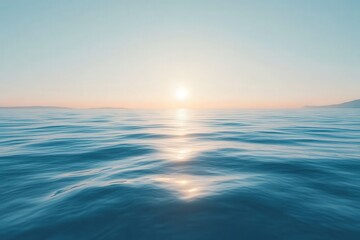 Obraz premium As the sun sets over the ocean, the sky changes colors at dusk