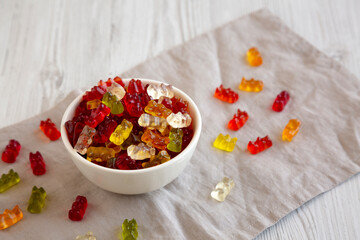 Colorful Gummy Bears in a Bowl, side view.