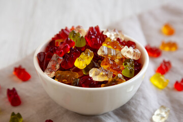 Colorful Gummy Bears in a Bowl, side view. Close-up.