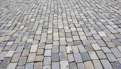 Cobblestone street texture with natural colors, urban aesthetics