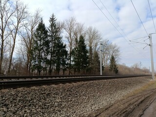 Two way railroad tracks in countryside. Two railway tracks. Sunny day. Countryside. Fields and...