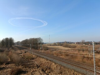 Two way railroad tracks in countryside. Two railway tracks. Sunny day. Countryside. Fields and...