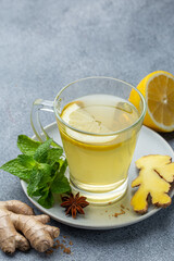 cup of lemon, ginger, mint and honey  tea