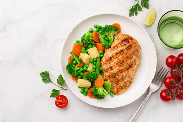 grilled  chicken breast with cooked  vegetables