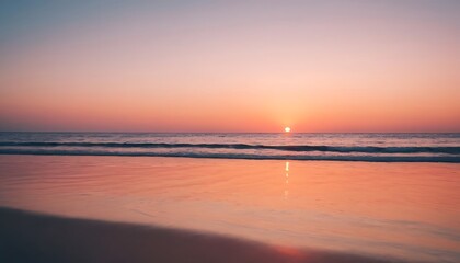 Fototapeta premium minimalist sunrise over calm ocean with pink orange hues blending into blue sky background,background, dusk, horizon, 945