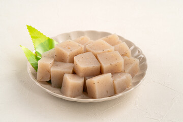 Raw konjac in square shape, also named konnyaku in Japan.