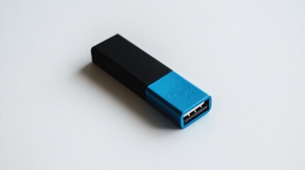 Modern black and blue portable power bank on white surface