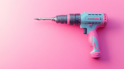 Pink cordless drill on pink background
