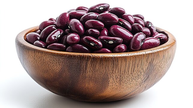 a wooden bowl filled with uncooked barbunya cranberry beans against a white background simple,natural presentation