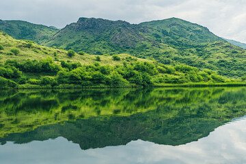 Fototapeta premium There is a lake with a mountain in the background