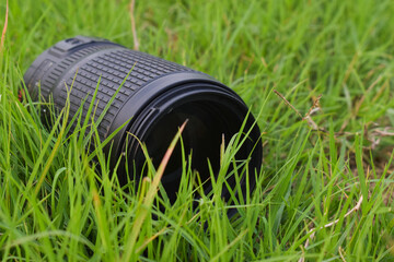 Close-Up DSLR Camera Lens with Bokeh Background - Professional Photography and Technology Concept,...