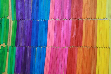 color wood background, rainbow colorful wooden wall.