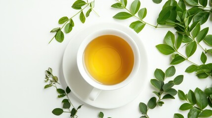 A serene cup of green tea surrounded by fresh leaves on a white background, ideal for wellness and relaxation themes