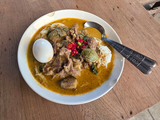 Thai green curry with noodles and boiled egg
