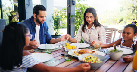 Praying, family and gratitude for meal, home and holding hands with children for faith or religion. House, people and parents with kids in morning, worship or praise for food, mom and dad with belief