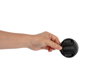 Camera Lens Cap in hand, isolated on transparent background.